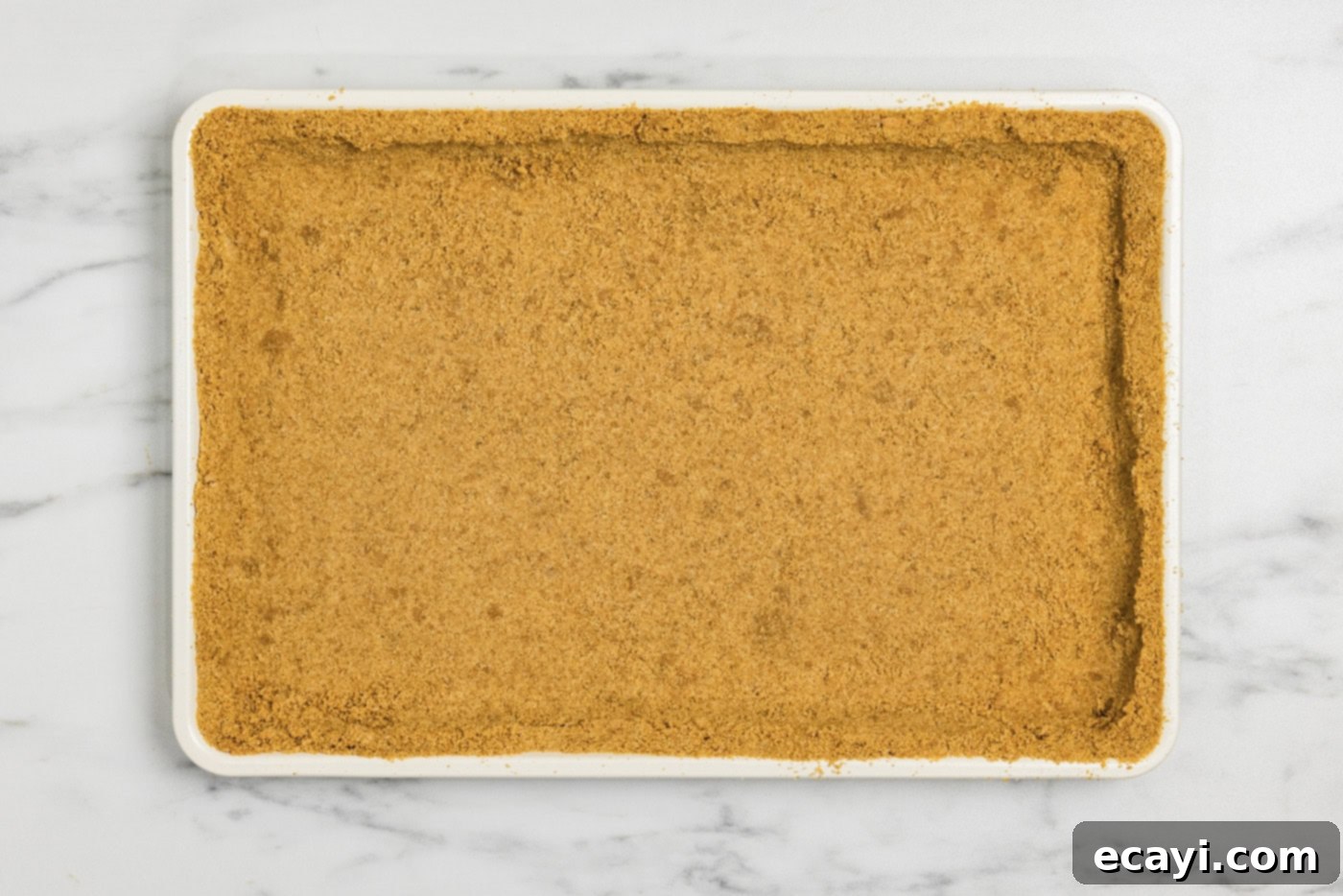 Tangy Key Lime Dessert Bars 6 graham cracker crust lined in a baking pan