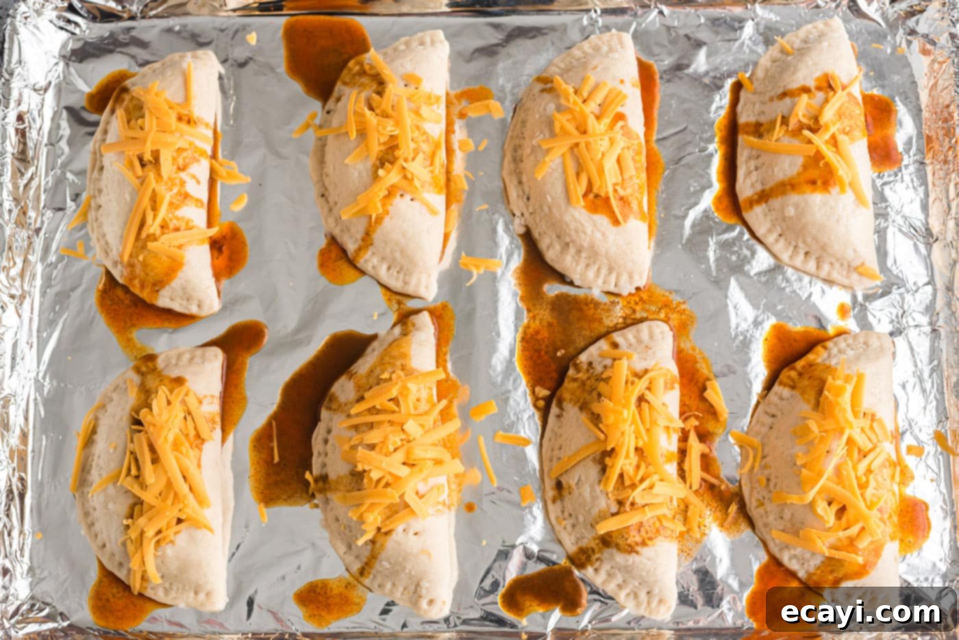 Crispy Taco Turnovers 12 cheese on top of taco empanadas