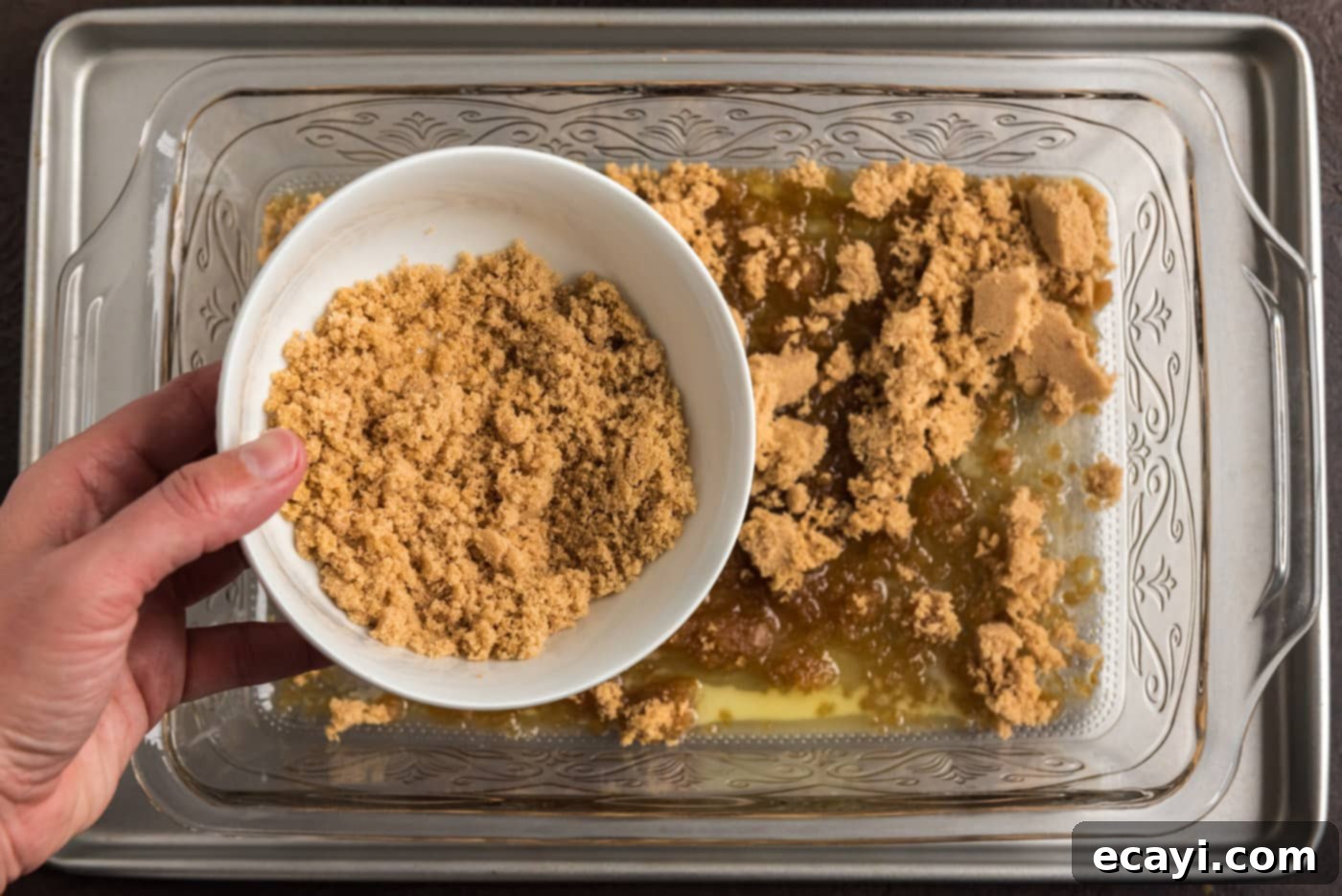 Blueberry Flip Cake 8 adding brown sugar to melted butter in baking dish