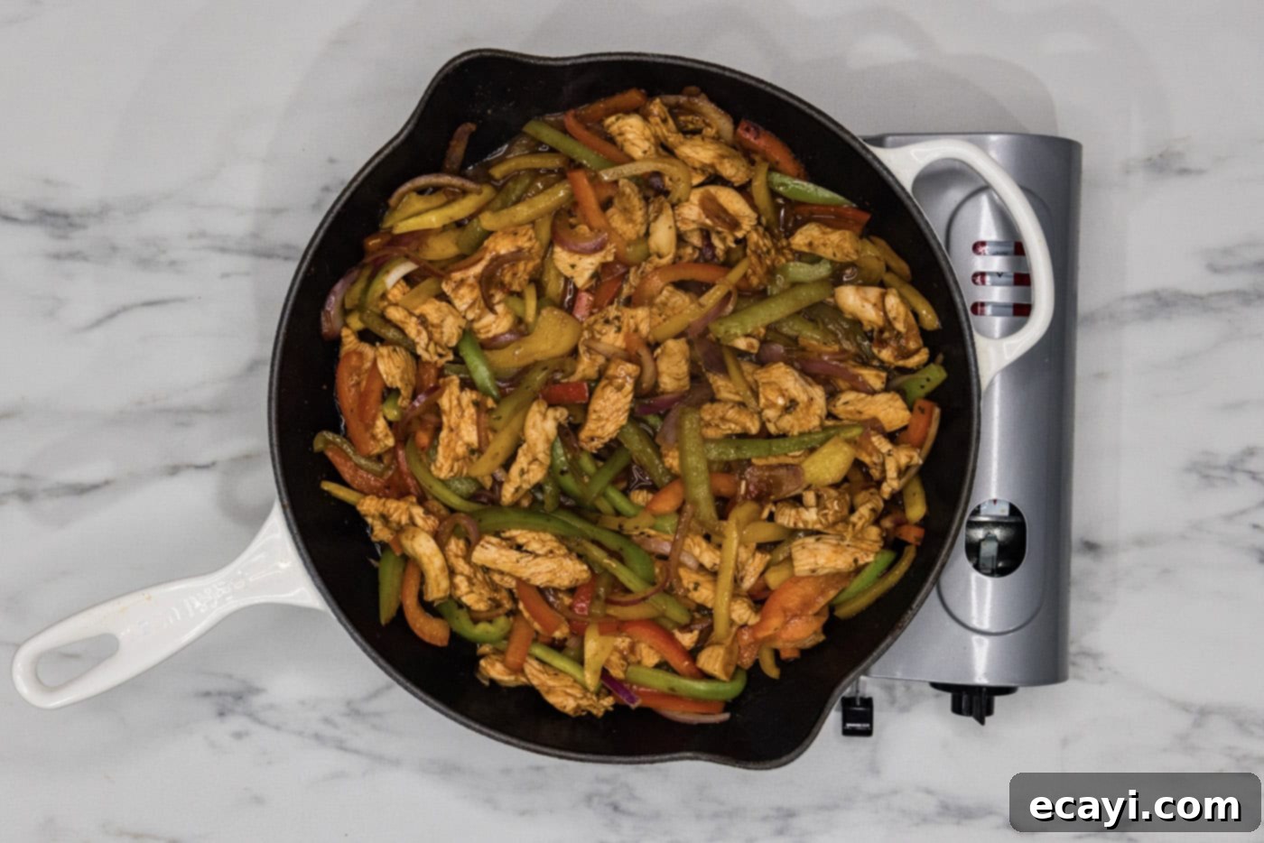 Sizzling Chicken Fajitas 8 chicken fajitas in a cast iron skillet