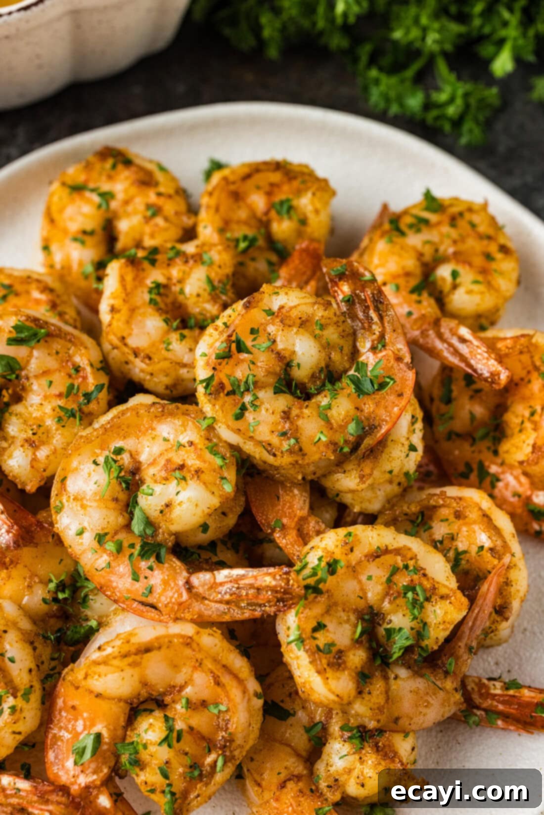 Zesty Lemon Broiled Shrimp 2 Close up photo of Broiled Shrimp on a plate