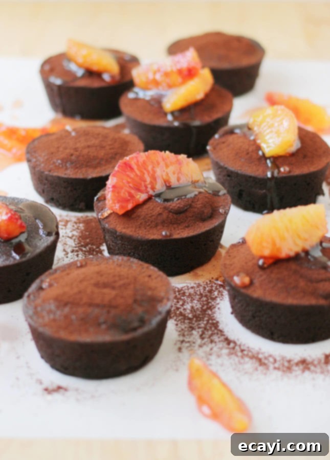 Decadent Blood Orange Chocolate Lava Cakes 8 Blood Orange and Dark Chocolate Fondant Cakes, a decadent dessert recipe.