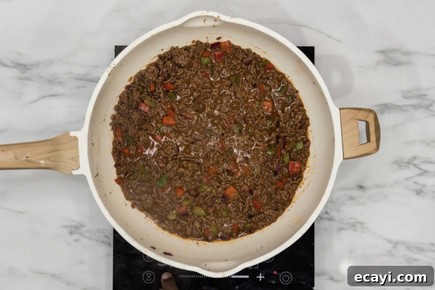 Philly Cheesesteak Messy Melts 7 Philly cheesesteak sloppy joe mixture simmering in a skillet