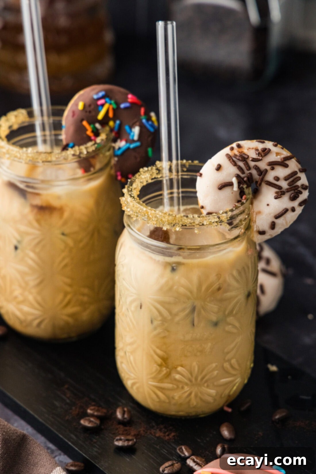 Velvet Espresso Chill 2 Close up photo of an Iced Espresso Cocktail with another one behind it, showcasing its rich layers and inviting appearance.