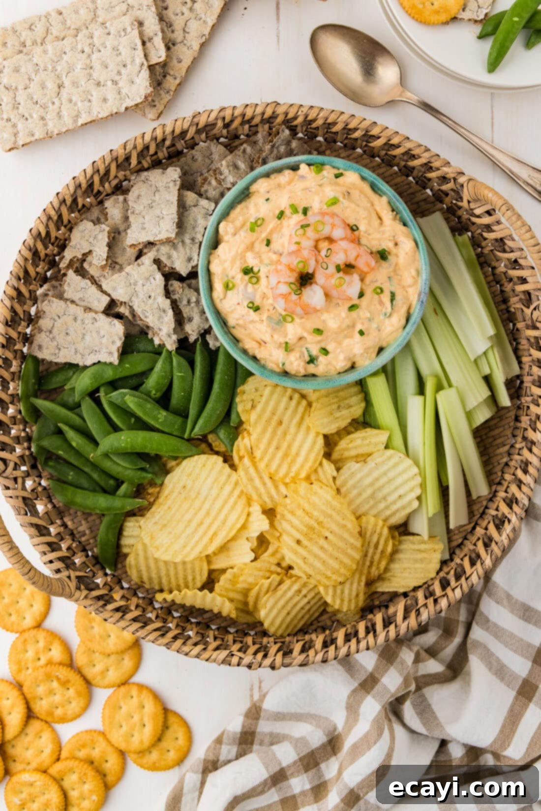 Creamy Shrimp Delight 10 Bowl of Shrimp Dip on a platter with an assortment of chips and fresh veggies for dipping