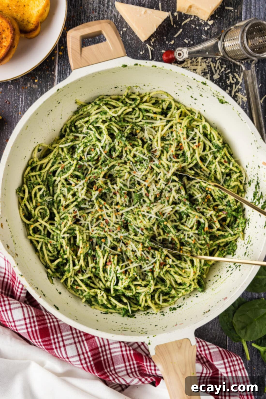 Vibrant Spinach Spaghetti 2 Skillet of Spinach Spaghetti with tongs in it, ready to serve.