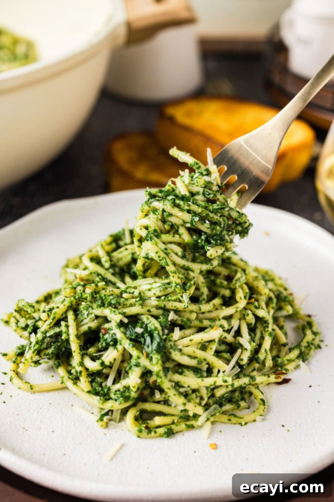 Vibrant Spinach Spaghetti 11 Spinach Spaghetti perfectly twirled around a fork, ready to eat.