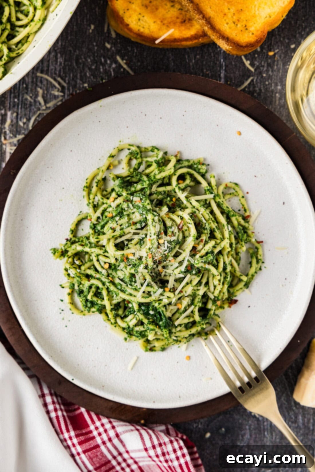 Vibrant Spinach Spaghetti 3 A perfectly plated serving of Spinach Spaghetti with a fork ready to enjoy.