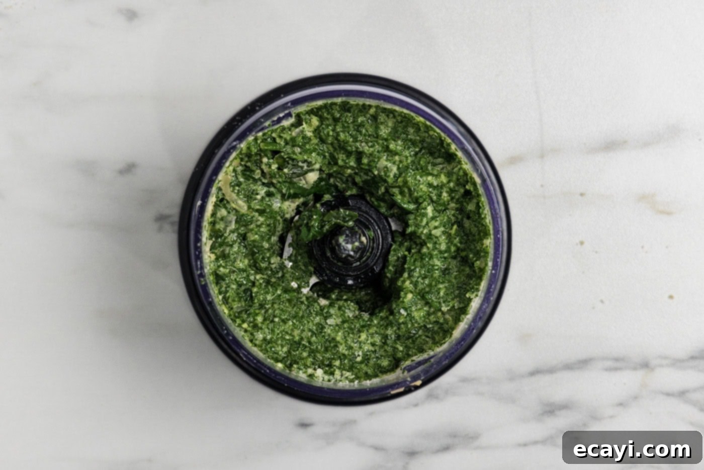 Vibrant Spinach Spaghetti 9 The perfectly blitzed parmesan and spinach sauce in a food chopper.