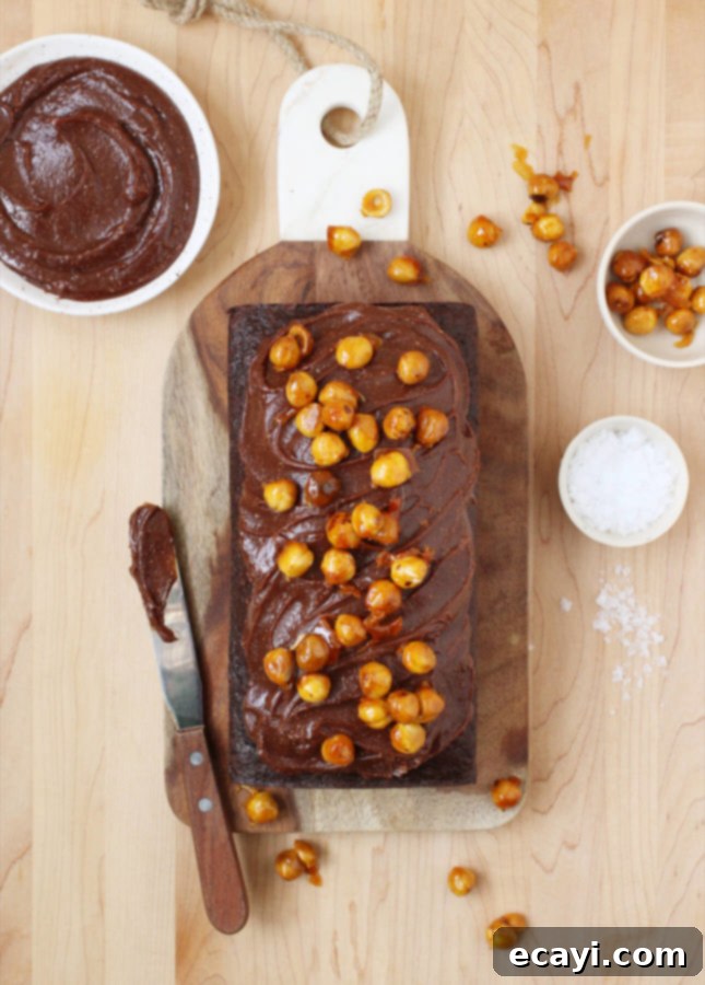 Decadent Chocolate Loaf with Gianduja Ganache 2 Chocolate Loaf Cake with Gianduja Ganache and Caramelized Hazelnuts // FoodNouveau.com