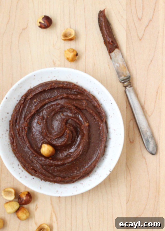 Decadent Chocolate Loaf with Gianduja Ganache 7 Chocolate Loaf Cake with Gianduja Ganache and Caramelized Hazelnuts // FoodNouveau.com