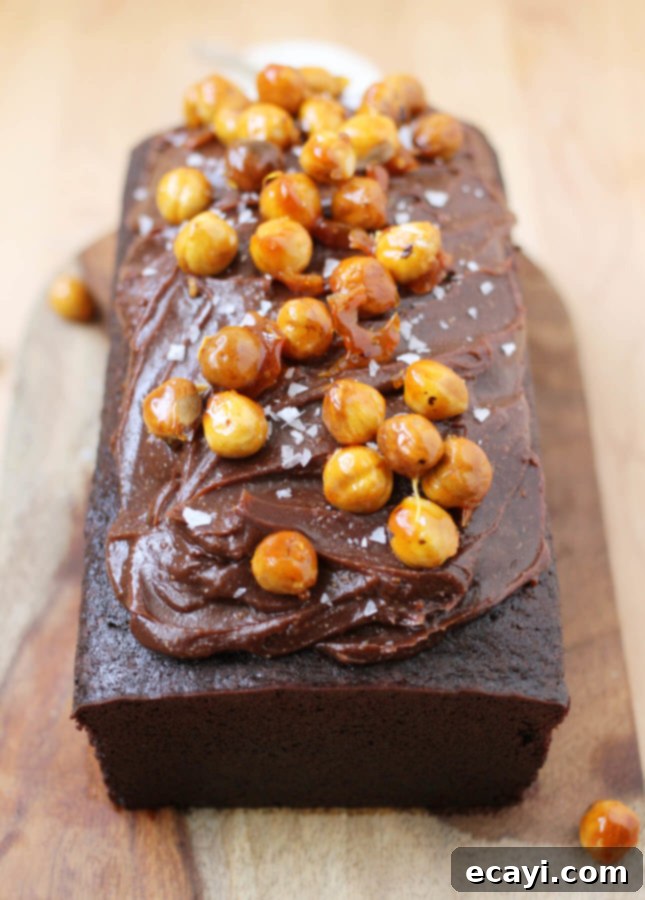 Decadent Chocolate Loaf with Gianduja Ganache 8 Chocolate Loaf Cake with Gianduja Ganache and Caramelized Hazelnuts // FoodNouveau.com