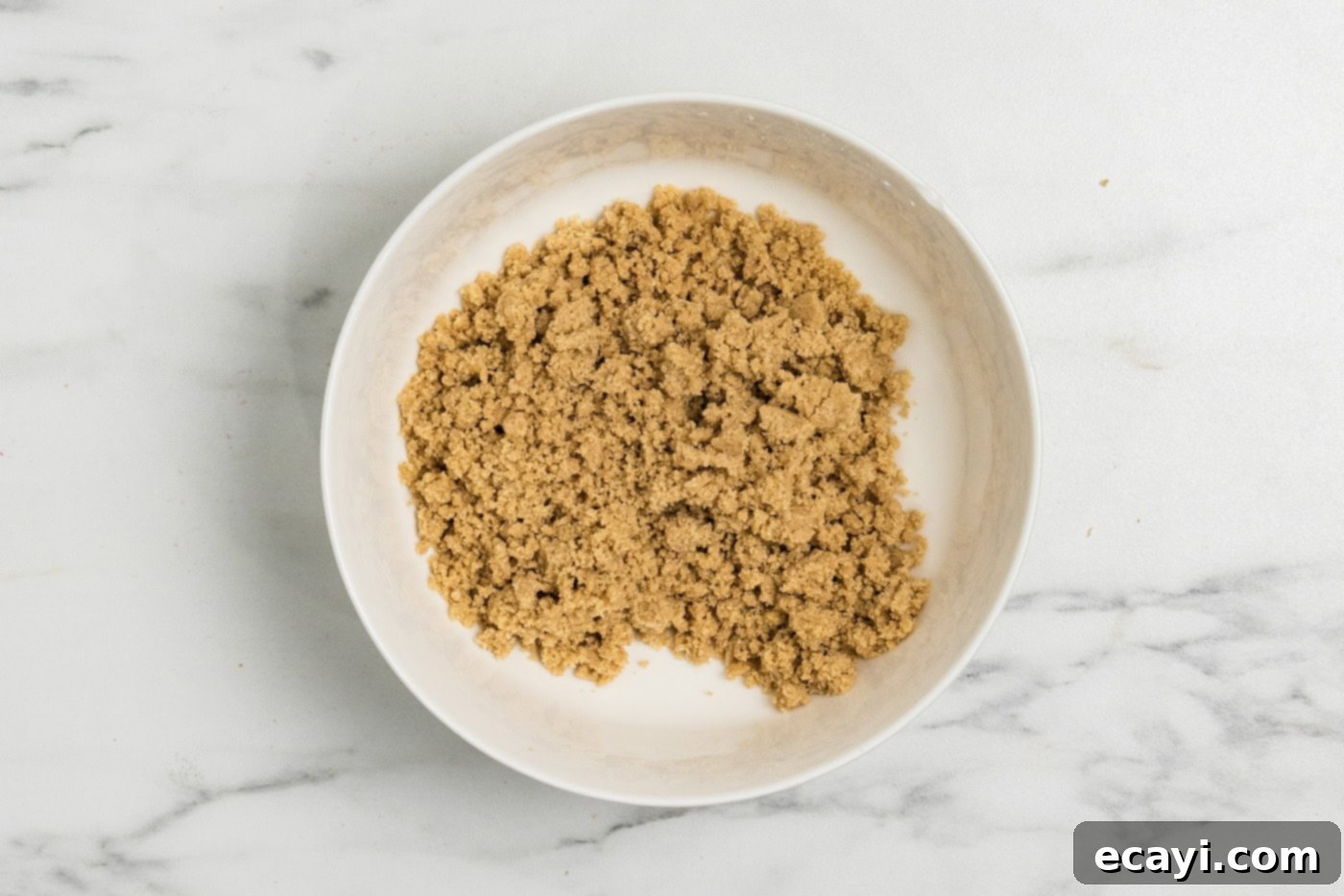 Spiced Apple Muffins 10 crumbly streusel topping in a bowl