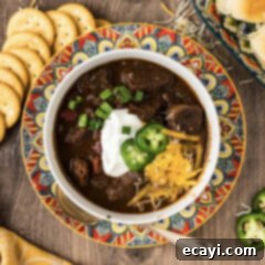 Fork-Tender Short Rib Chili 11 Bowl of Short Rib Chili with crackers on the side, ready to serve
