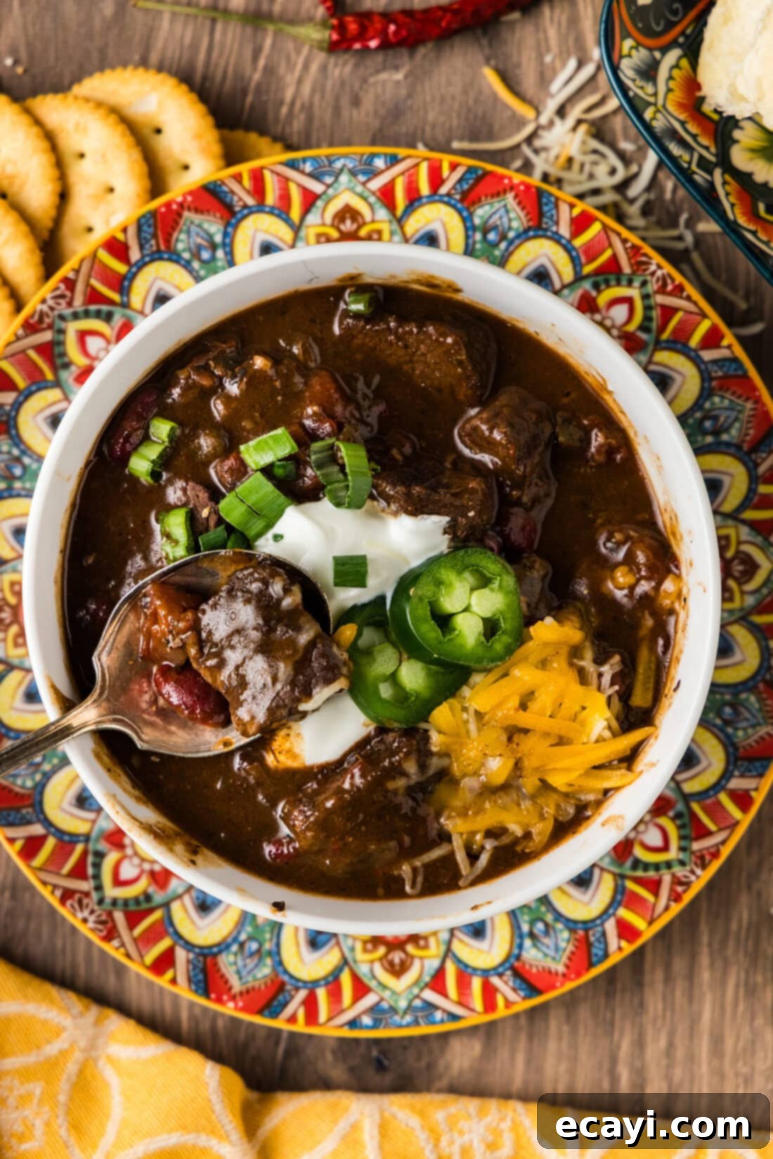 Fork-Tender Short Rib Chili 3 A comforting bowl of Short Rib Chili with a spoon, ready to be enjoyed