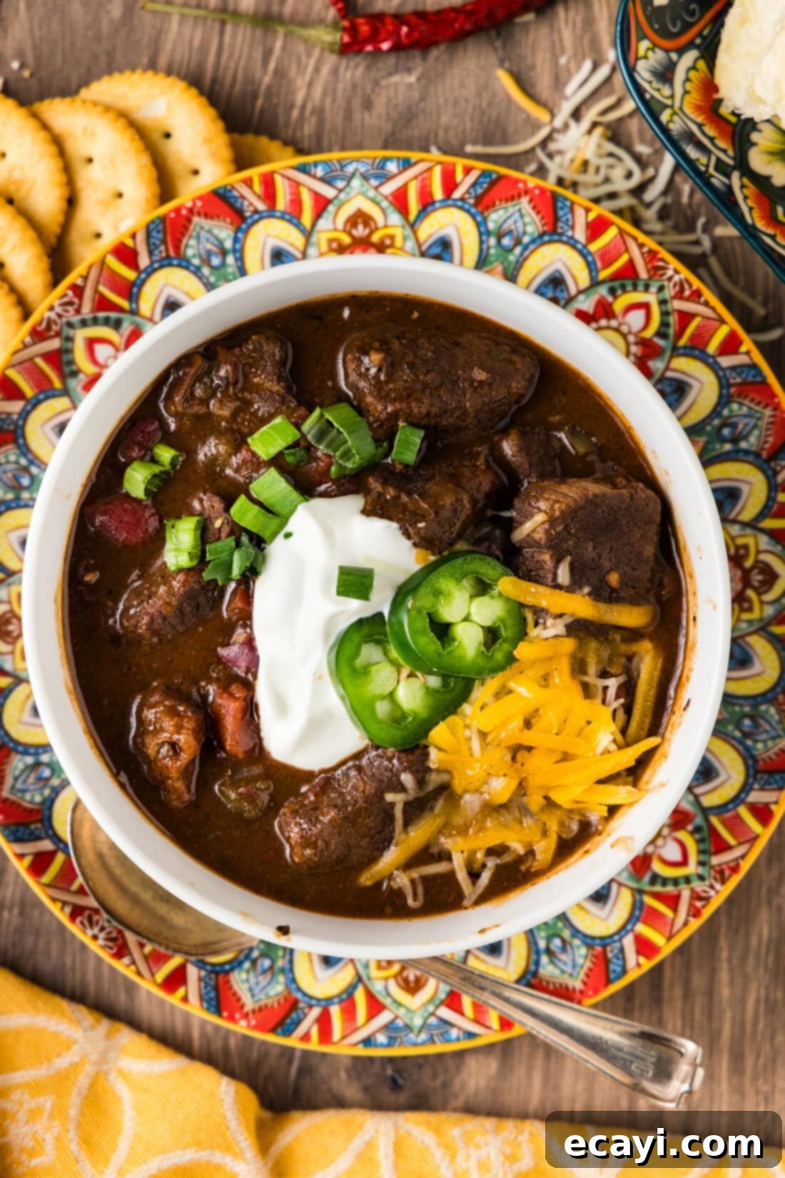 Fork-Tender Short Rib Chili 10 Close up photo of a perfectly portioned bowl of Short Rib Chili, garnished and ready