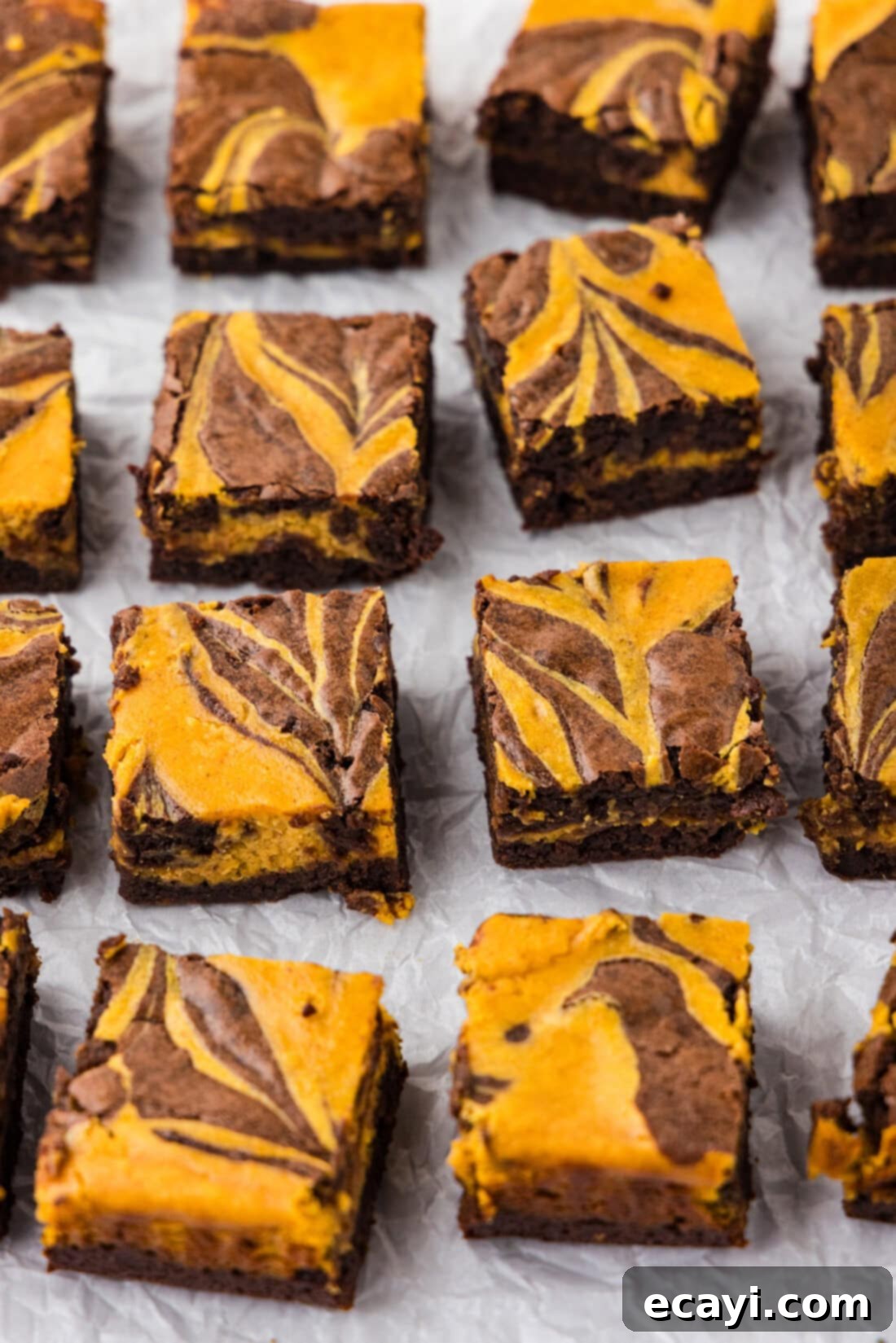 Spiced Pumpkin Cheesecake Swirl Brownies 16 Pumpkin Cheesecake Brownies cut into. squares