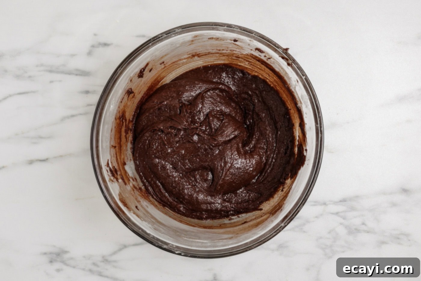 Spiced Pumpkin Cheesecake Swirl Brownies 9 brownie batter in a bowl