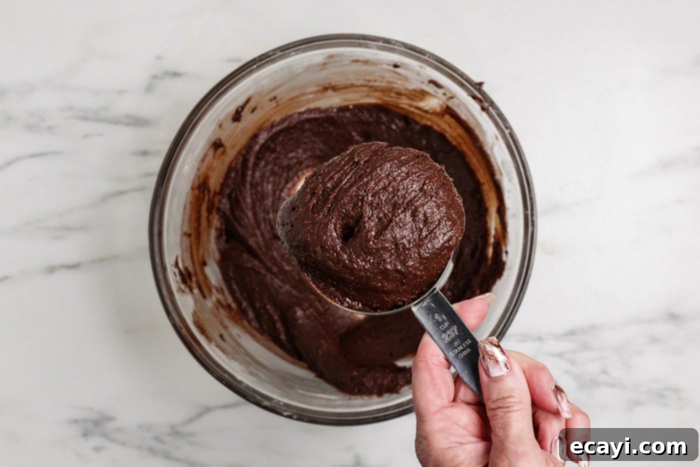Spiced Pumpkin Cheesecake Swirl Brownies 10 Scooping 1 heaping cup of brownie batter with a measuring cup