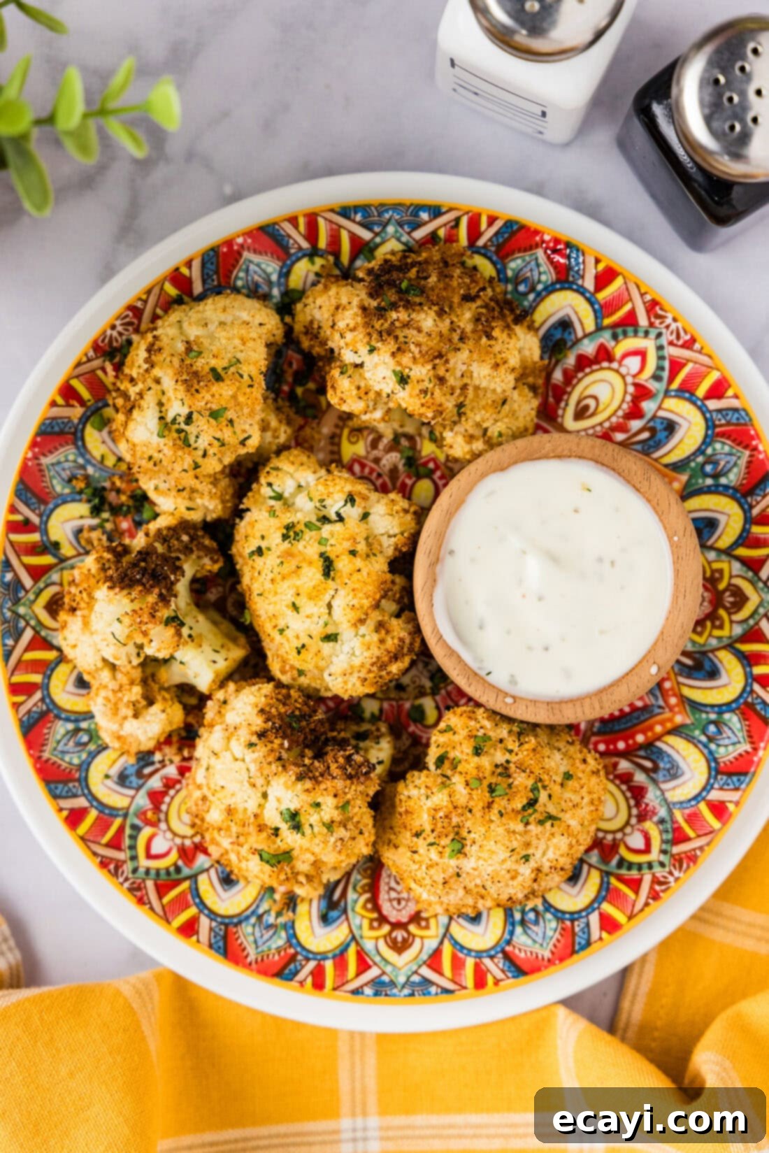 Crispy Air Fried Cauliflower 2 Air Fryer Fried Cauliflower on a plate with ranch