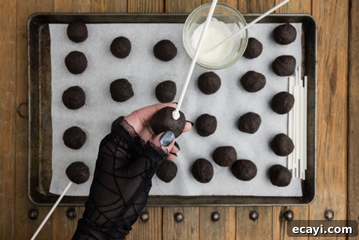 Pharaoh's Pops 10 A lollipop stick inserted into the bottom of an Oreo truffle ball, securely held with set chocolate