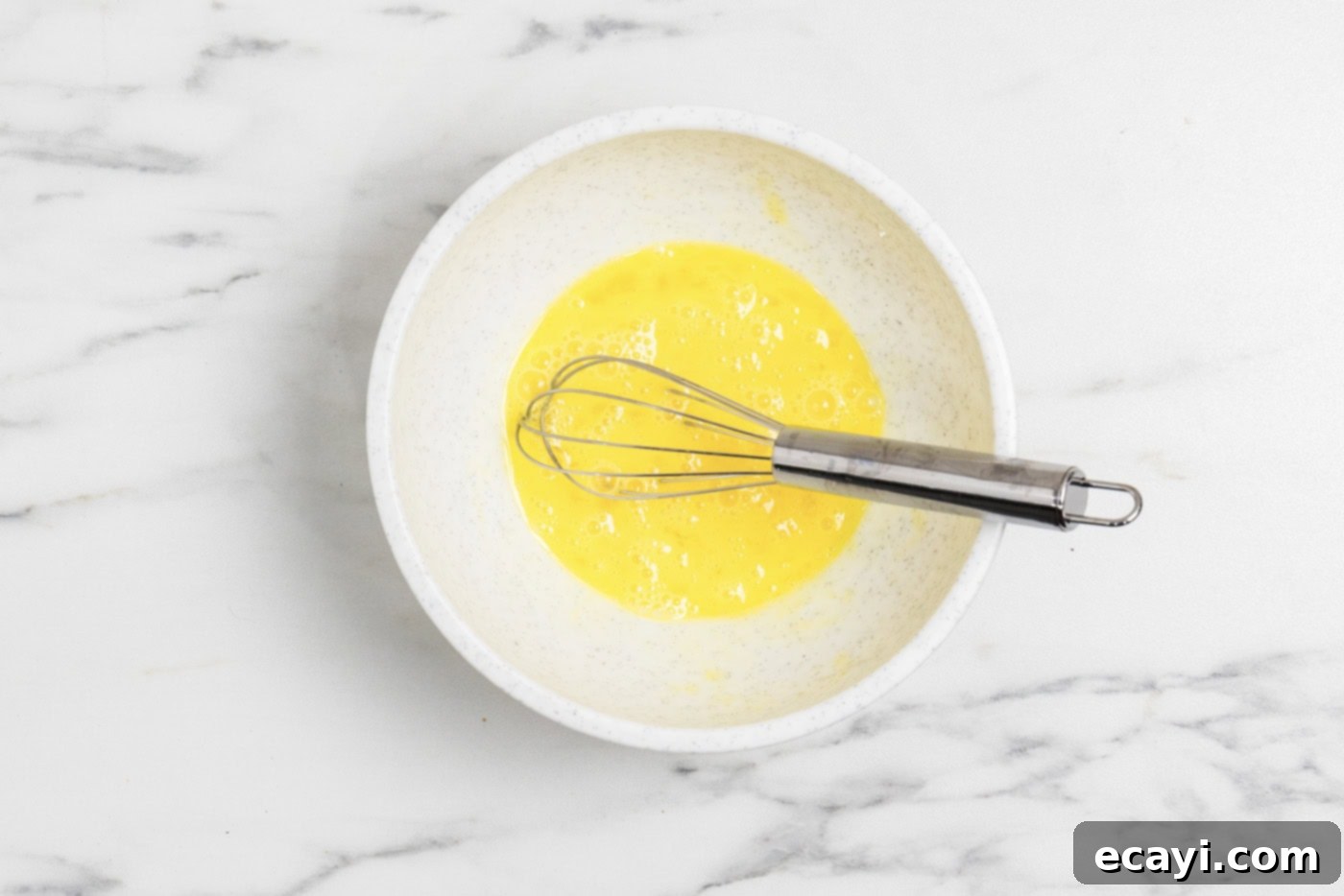 Luscious Chicken Carbonara 5 eggs whisked in a bowl