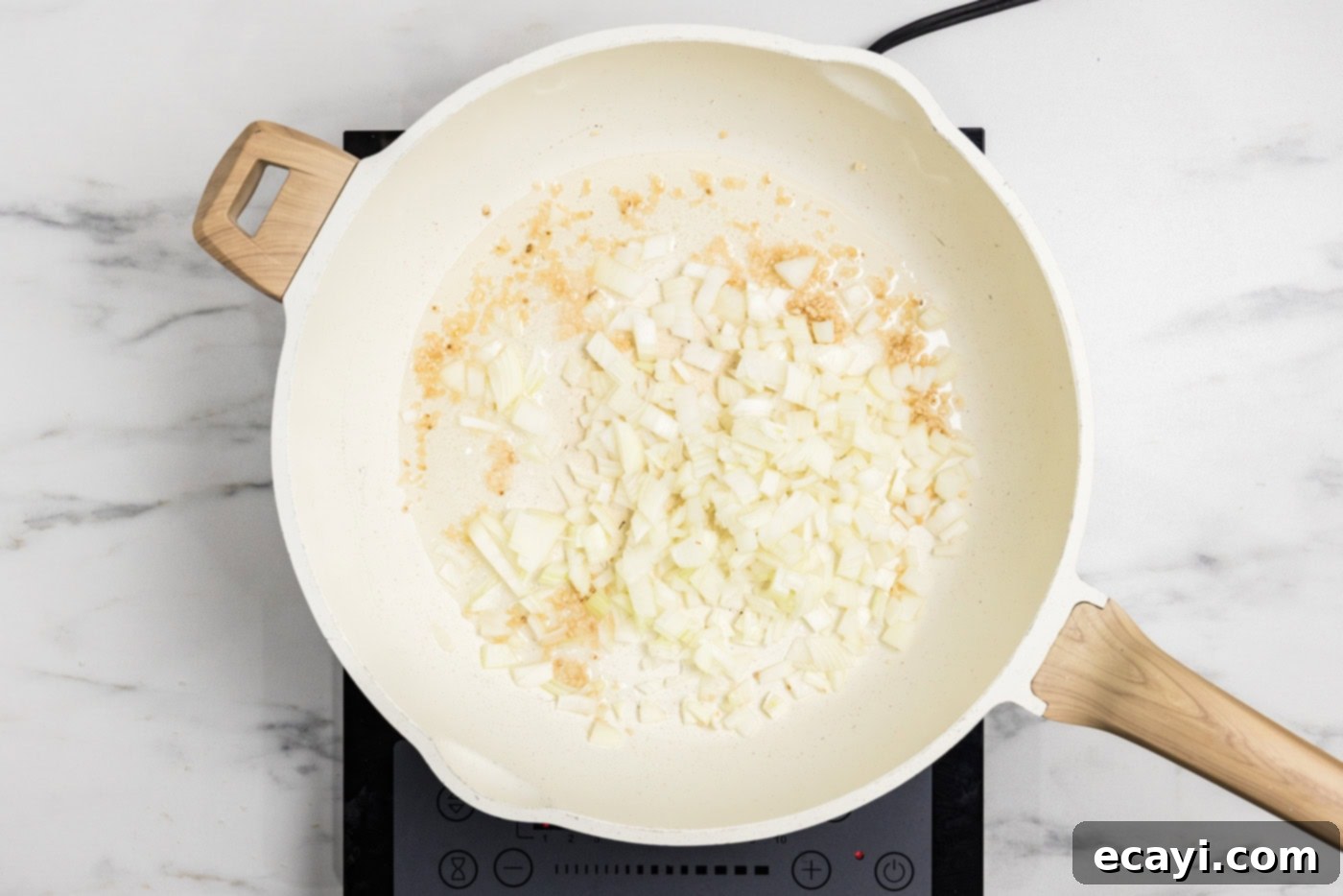 Luscious Chicken Carbonara 6 onion and garlic sauteed in a skillet with oil