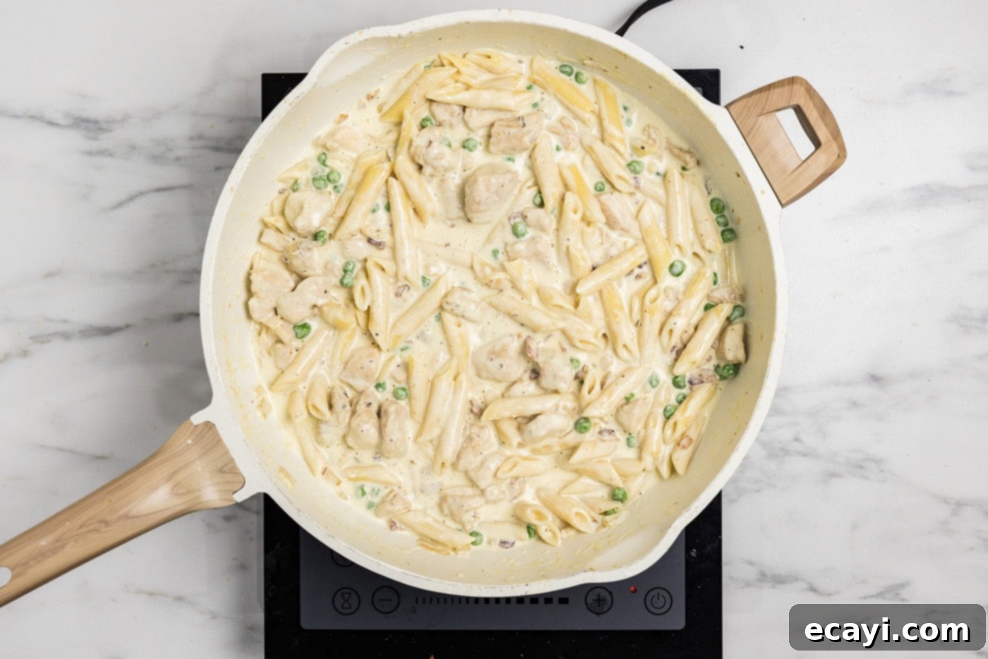 Luscious Chicken Carbonara 10 overhead photo of finished chicken carbonara in a skillet