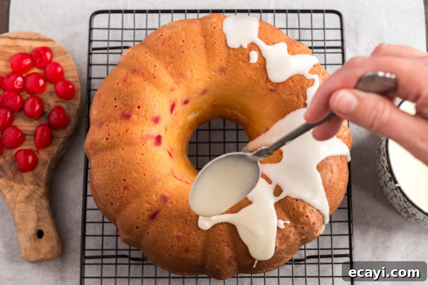 Ruby Maraschino Bundt 15 drizzling almond butter glaze over cherry bundt cake