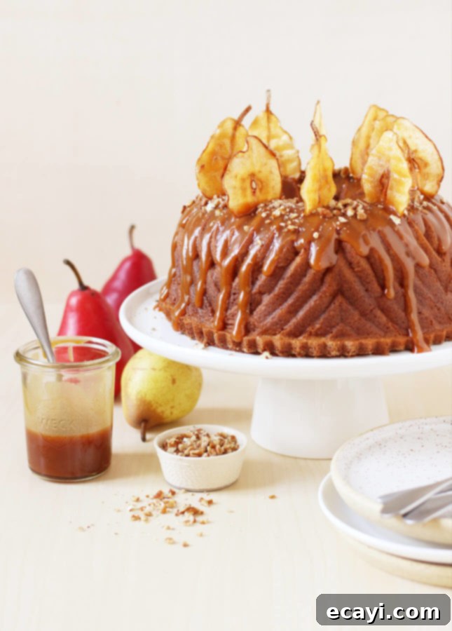 Golden Spiced Pear Bundt Caramel Cascade 4 Spiced Pear Bundt Cake with Salted Caramel Sauce // FoodNouveau.com