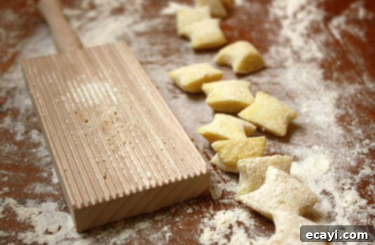 Rolling Homemade Gnocchi Dough on a Gnocchi Board // FoodNouveau.com Rolling Homemade Gnocchi Dough on a Gnocchi Board // FoodNouveau.com