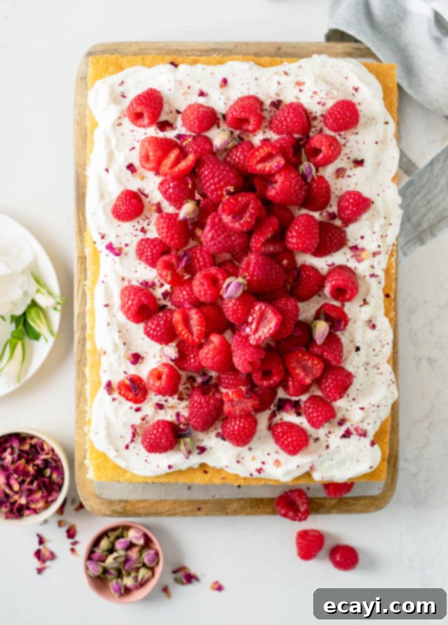 The Ultimate Easy Layered Sheet Cake 3 Preparing the versatile vanilla sponge sheet cake batter in a mixing bowl