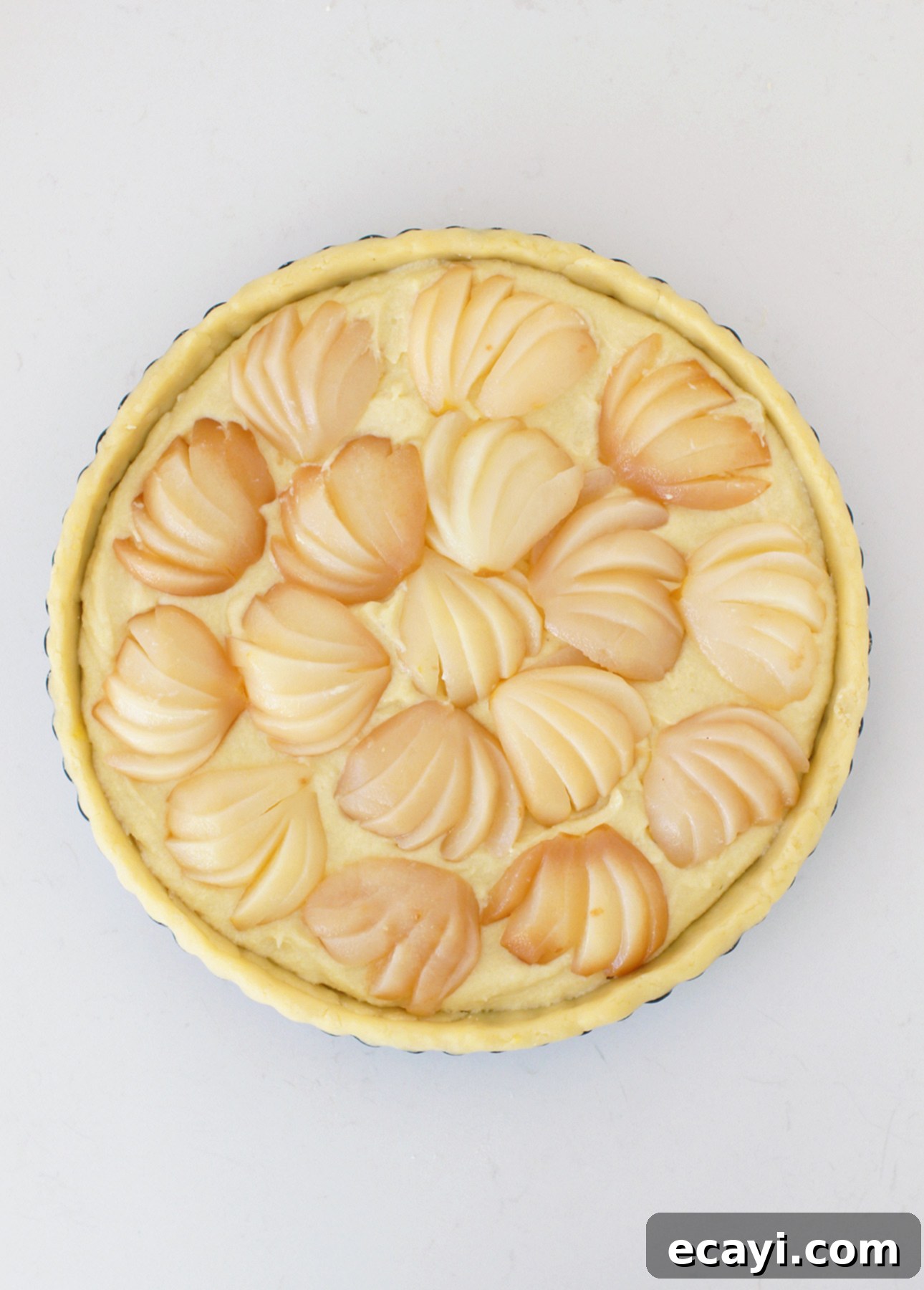 Almond-Kissed Spiced Pear Tart 4 Unbaked Spiced Pear Frangipane Tart, ready for the oven