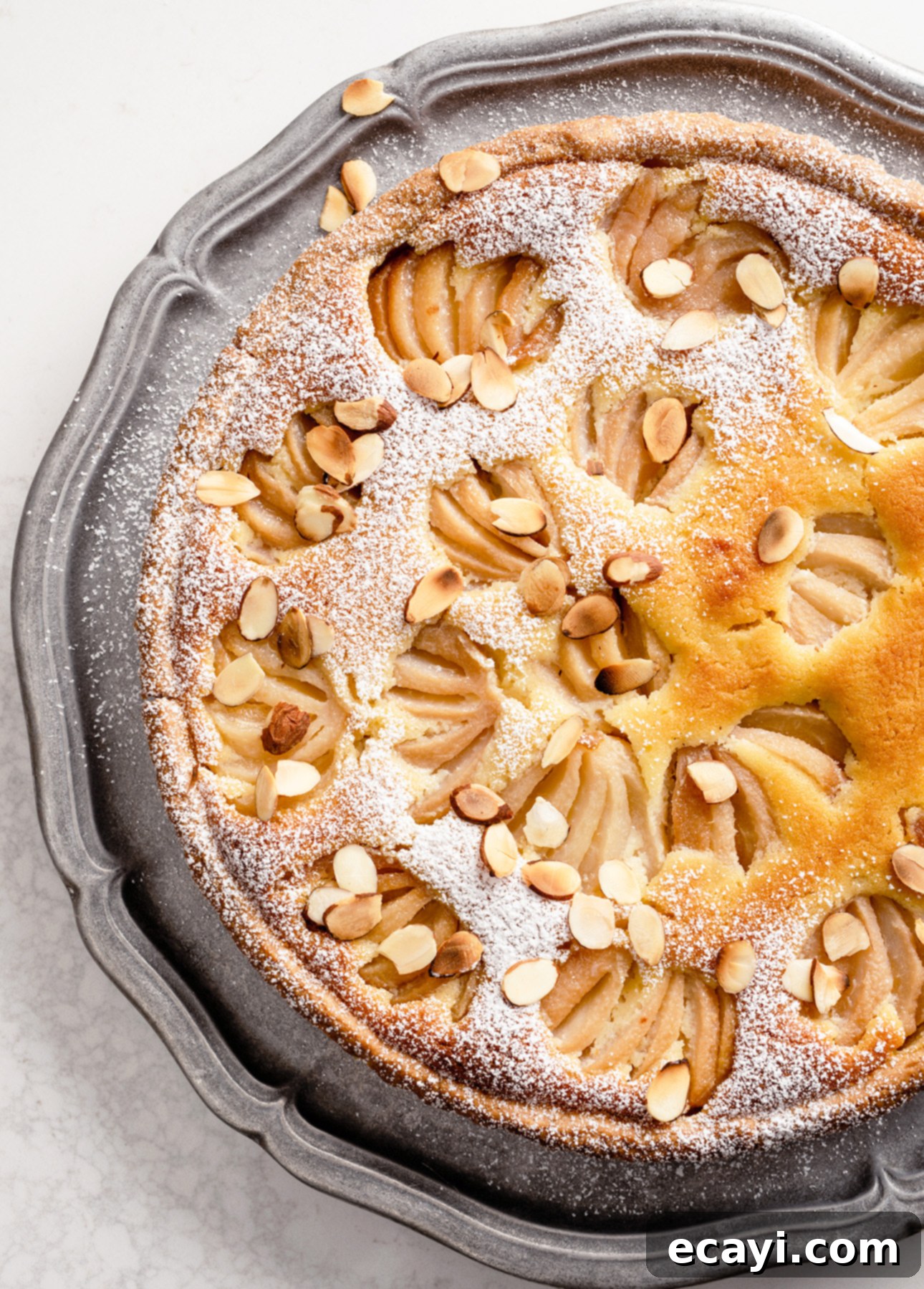 Almond-Kissed Spiced Pear Tart 5 Beautifully baked Poached Pear and Almond Tart