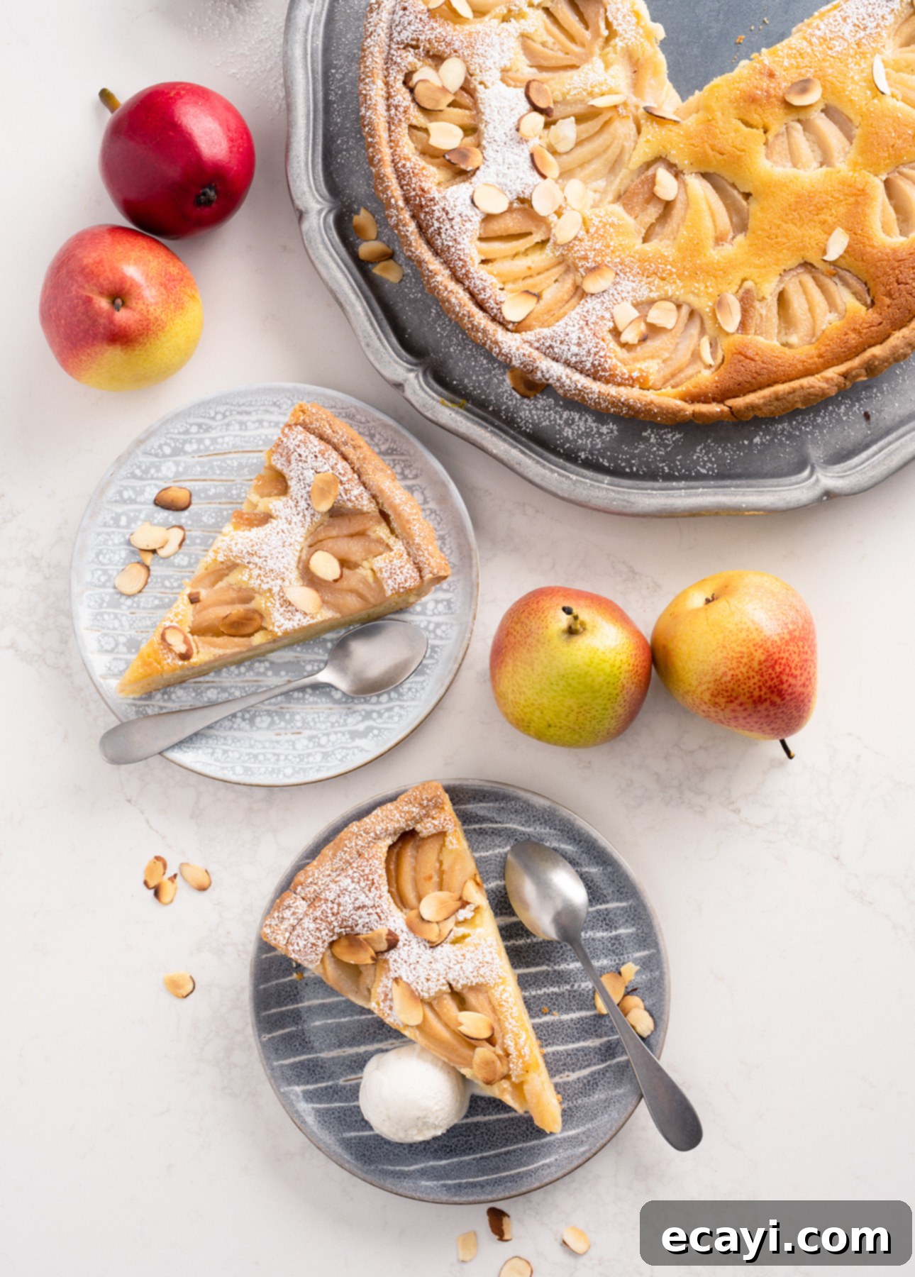 Almond-Kissed Spiced Pear Tart 8 A slice of Poached Pear and Almond Tart, ready to serve