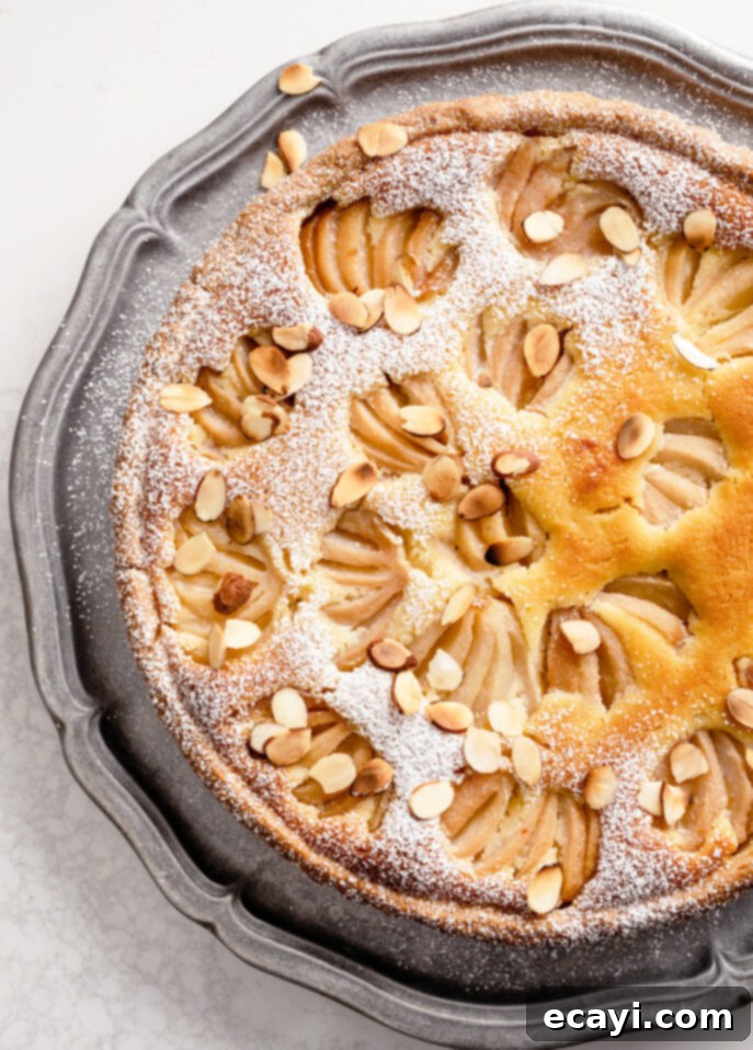 Almond-Kissed Spiced Pear Tart 9 Poached Pear and Almond Tart // FoodNouveau.com
