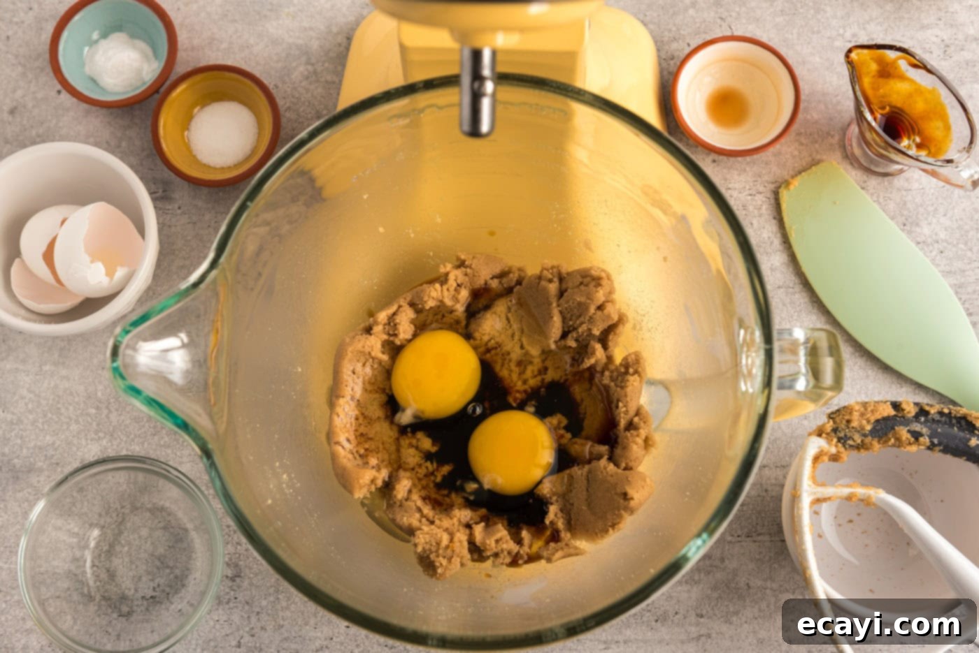 Twisted Pretzel Chocolate Chip Cookies 6 eggs and molasses added to sugar mixture in a stand mixer bowl