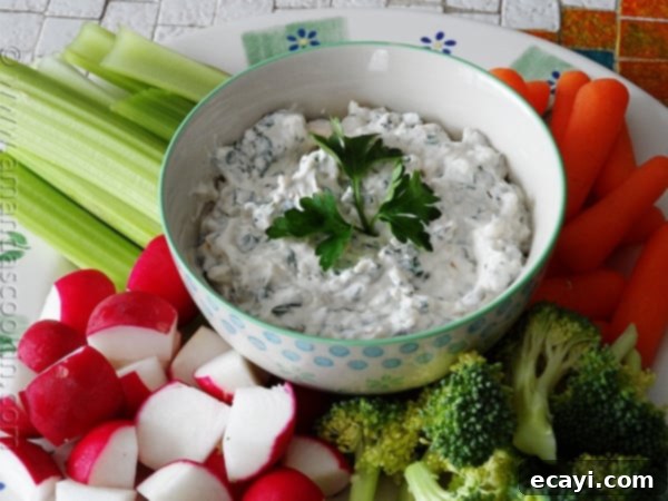 Guilt-Free French Onion Dip 7 Cheesy Pesto Dip at AmandasCookin.com @amandaformaro
