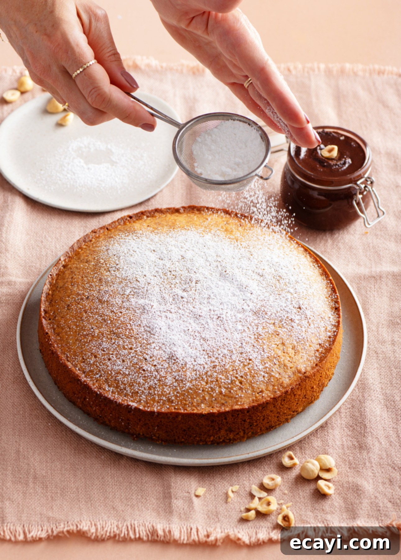 Classic Italian Hazelnut Torte 7 A slice of Torta di Nocciole (Italian Hazelnut Cake) on a plate, ready to be served