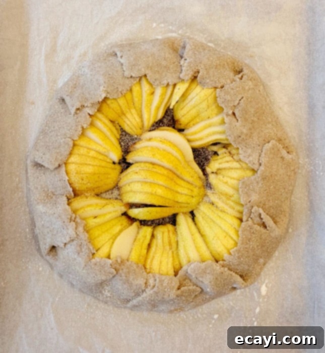 Rustic Pear & Chocolate Almond Galette 6 The assembled Pear and Chocolate Frangipane Galette, ready for baking. // FoodNouveau.com