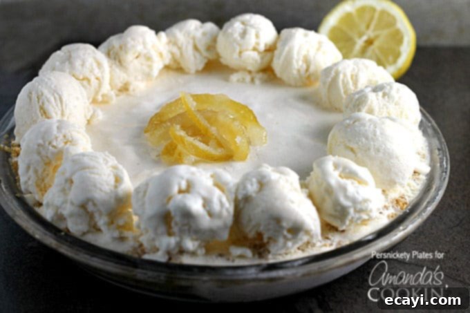 Lemon Icebox Dream Pie 4 A close-up shot of the finished frozen lemonade pie, perfectly set and ready to be sliced and enjoyed.