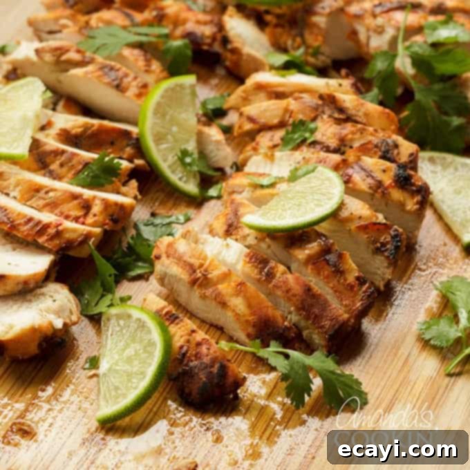 Tender Grilled Chicken Kebabs 6 Delicious Chile Lime Chicken cooking on the grill, showcasing a beautiful char.