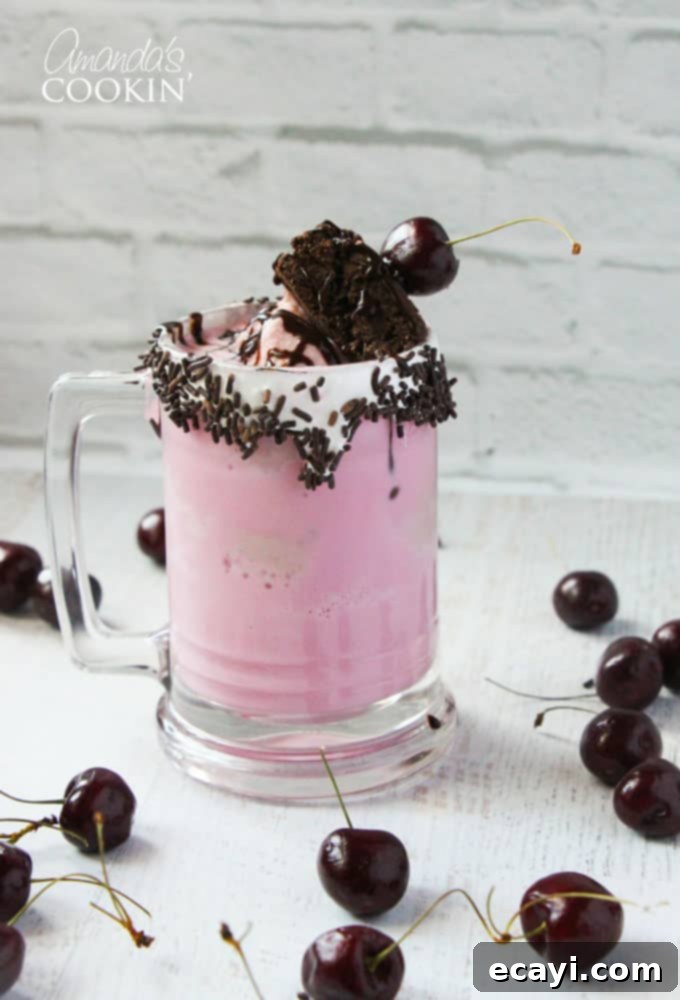 Freakshakes Wildly Indulgent Shakes 7 A delightful fudge brownie, perfectly positioned to be used as a topping, resting on a clean surface.