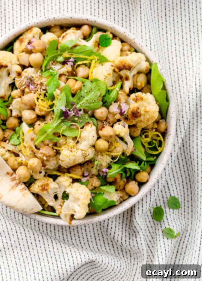 Roasted Chickpea and Cauliflower Salad with a Spicy Kick 5 Spicy Roasted Chickpea and Cauliflower Salad // FoodNouveau.com