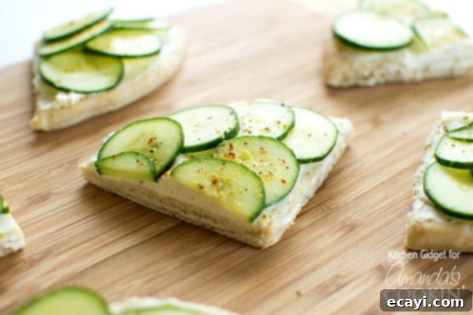 What do you get when you combine crisp cucumbers, zesty cream cheese, and soft pita bread? These mouthwatering cucumber sandwiches! sandwiches made with cucumber and cream cheese