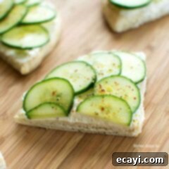 Delicate Garden Bites 2 cucumber sandwich on cutting board