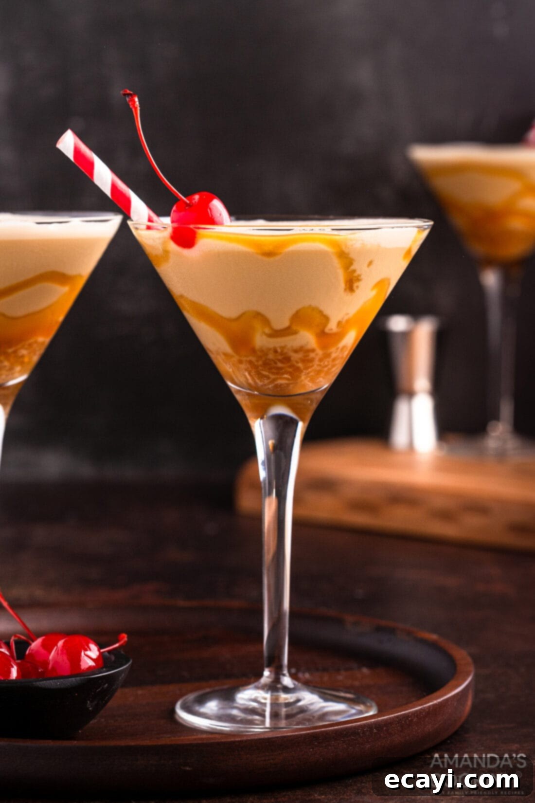 Butterscotch Velvet Sip 9 butterscotch milkshake cocktail in a martini glass with a cherry garnish