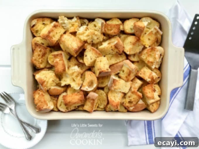 Overnight French Toast Bake 5 An overhead of a 9x13 baking pan filled with cut up french baguettes.