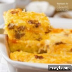 Hearty Turkey Hash Brown Breakfast Bake 6 A close up of a square of turkey hash brown breakfast casserole on a spatula.