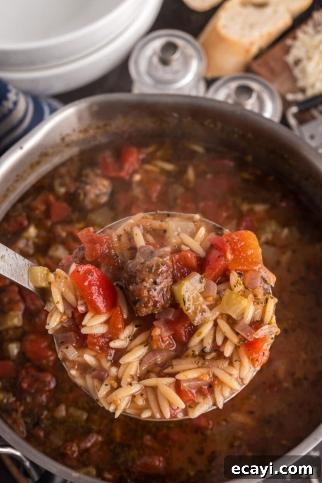 Hearty Sausage Orzo Soup 11 Ladle of Italian Sausage Tomato Orzo Soup